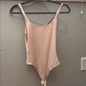 light pink body suit (garage)